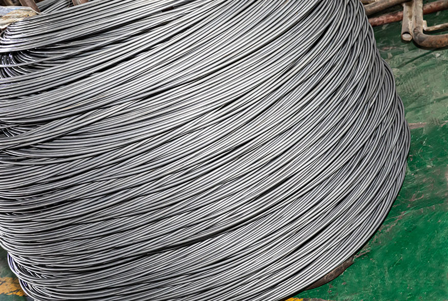 How does the low carbon content in this type of steel impact its mechanical properties?