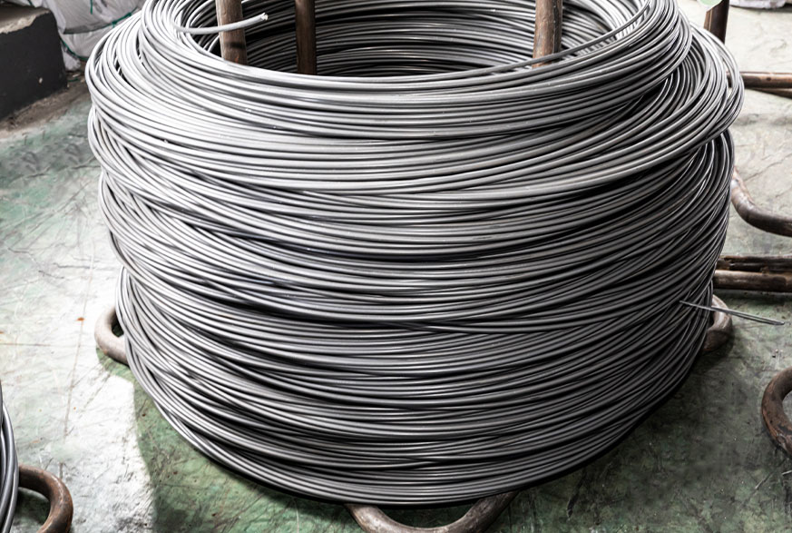 How is carbon steel classified based on carbon content?